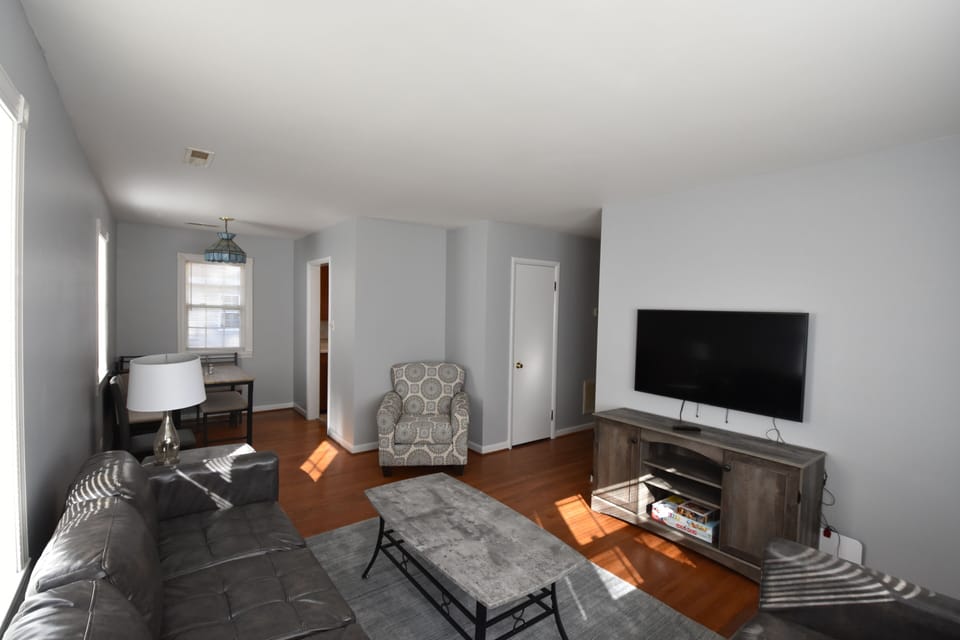 Spa like setting in the living room with a fresh gray color scheme.
