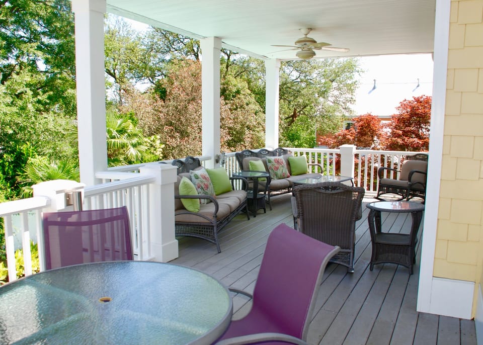 2nd floor furnished deck w/dining table and chairs right outside kitchen door.