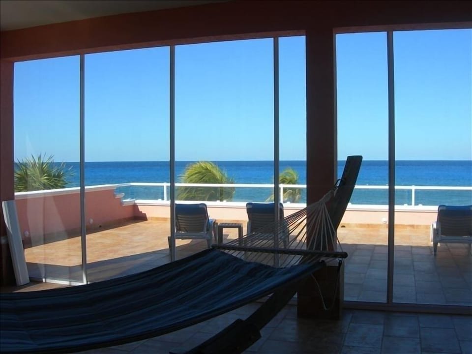 Upstairs terrace with hammock.  Perfect place for a short nap after diving!