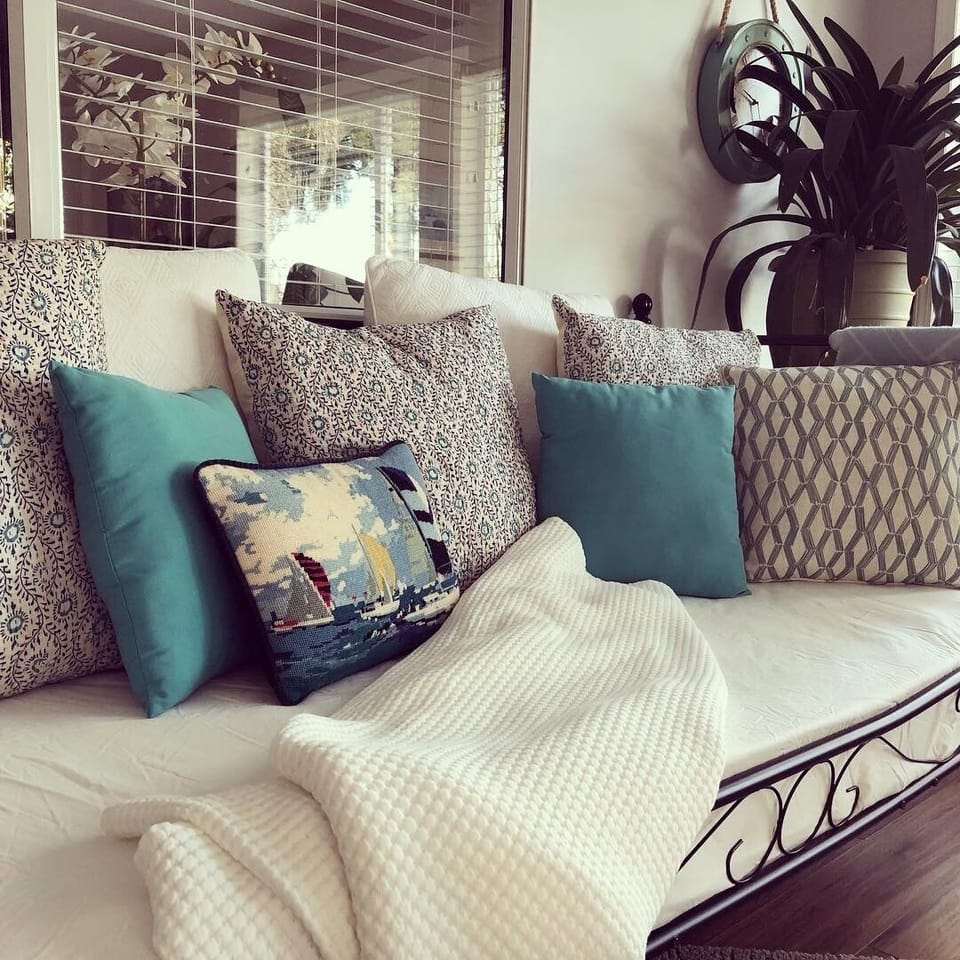 Daybed in sunroom ~ perfect for reading or an extra guest. 