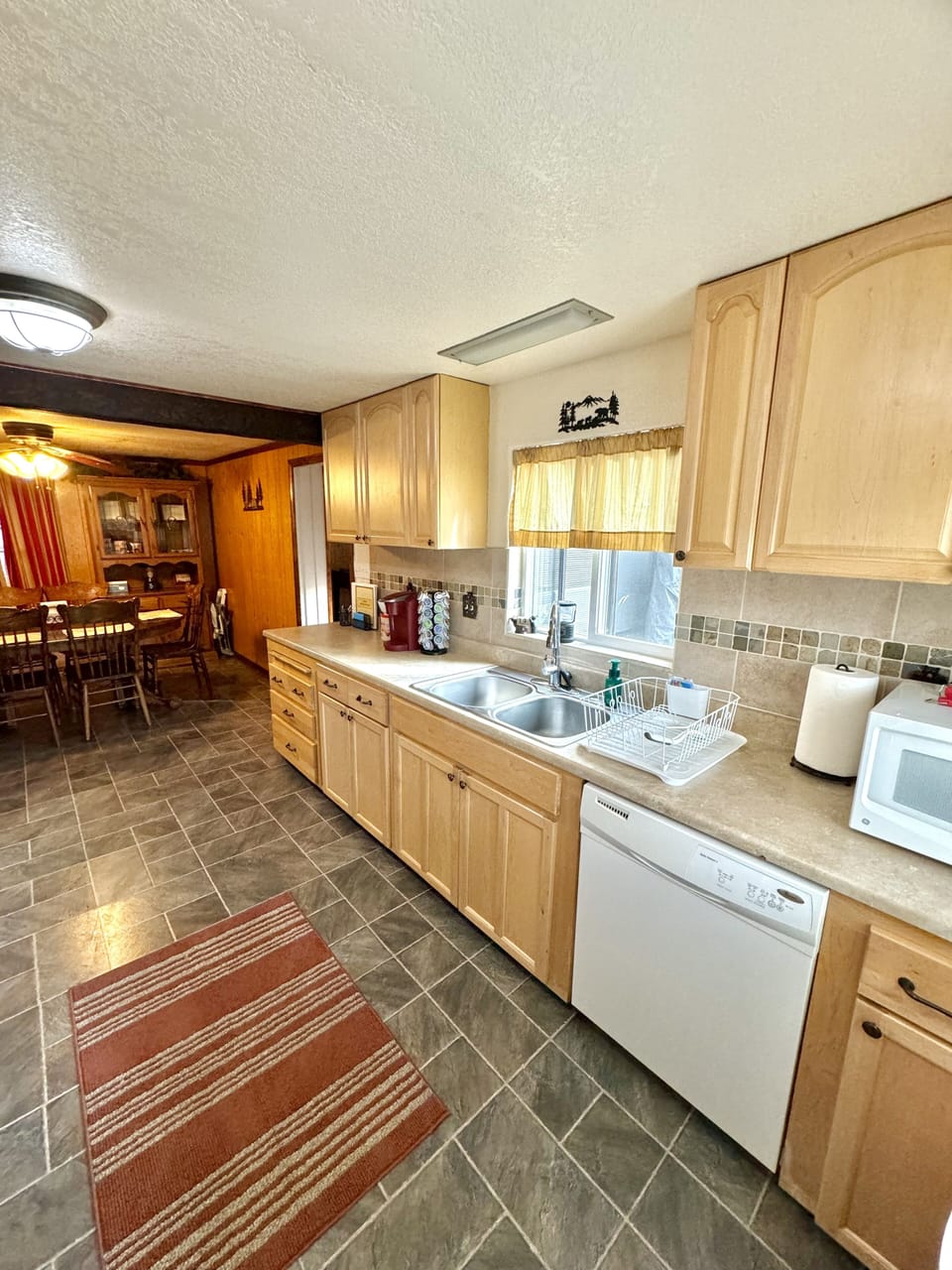 Kitchen with Attached Dining Area that Seats 6