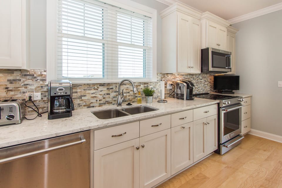 Gourmet kitchen with all the latest appliances along with two dishwashers.