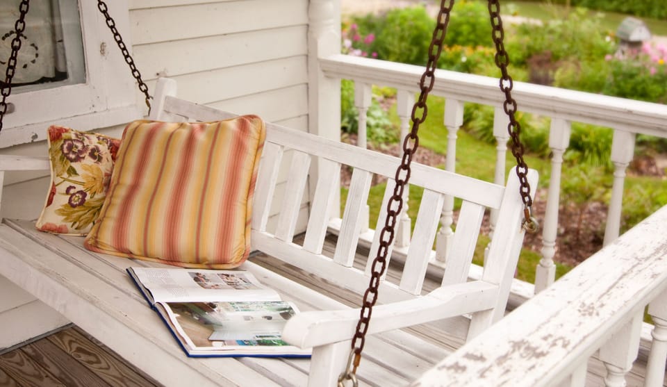Watch the world go by from the porch swing