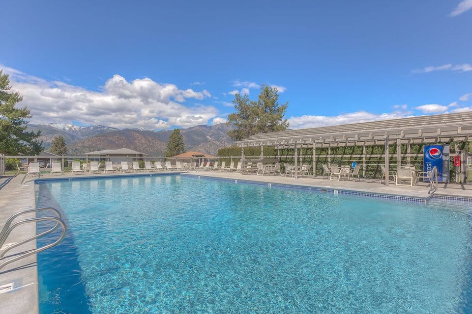 Fabulous pool is directly across the driveway from Sunshine House!