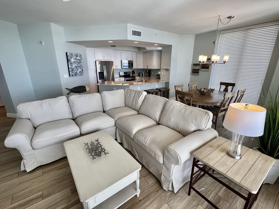 Slipcovered sofa sectional provides plenty of seating. 