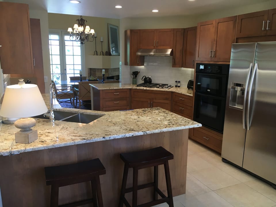 Kitchen looking thru to dining area and mountain views thru French doors. 