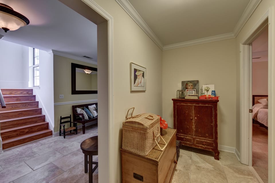Entry to downstairs guest bedrooms and stairs leading to main floor