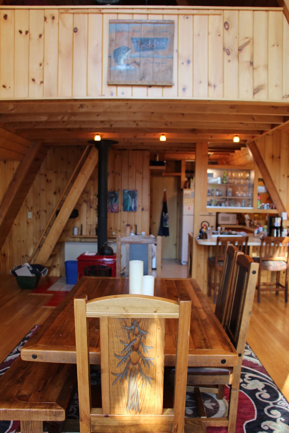 Aframe Dinner table looking towards kitchen.