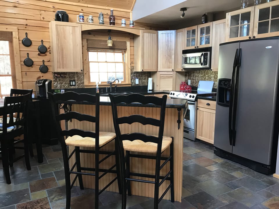 Open concept kitchen fully equipped 
