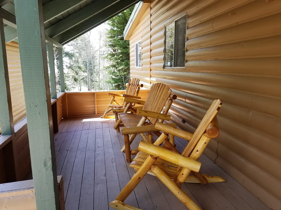 Great front porch for relaxing - glider and 2 rockers for morning coffee 