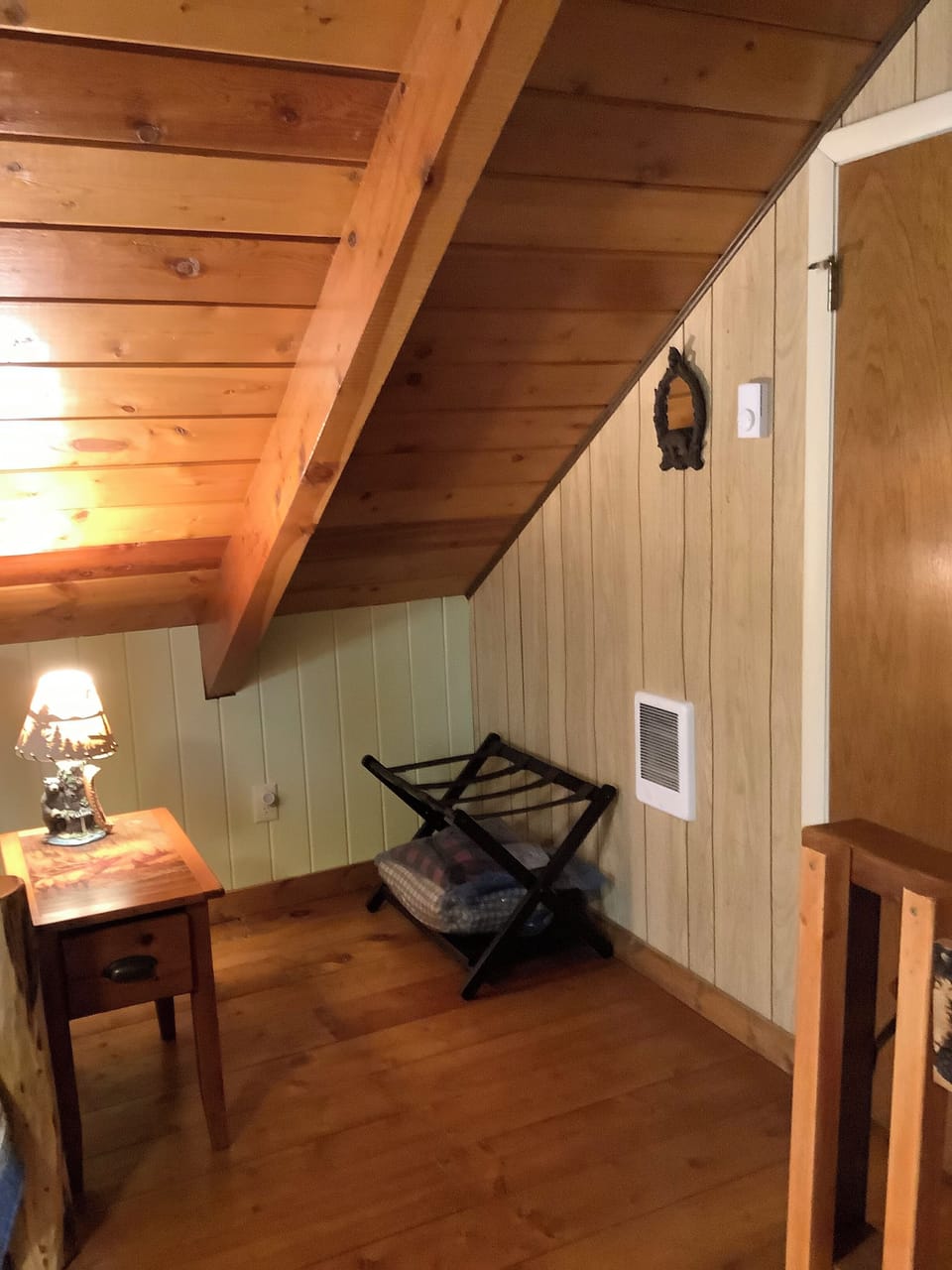 Loft luggage rack and in-wall heater for blustery days