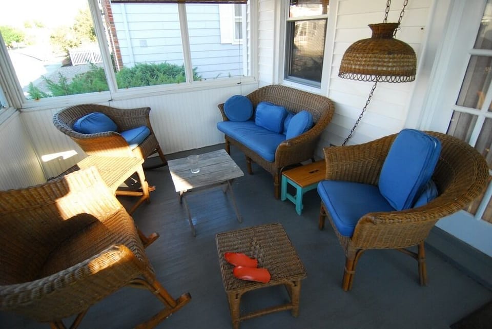 Front porch, our favorite room includes a picnic table to rear
