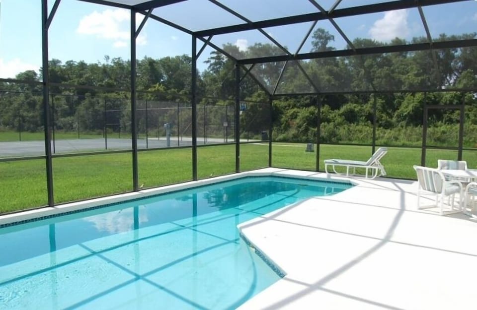 Oversized pool and pool deck with tennis court and pond...PRIVATE