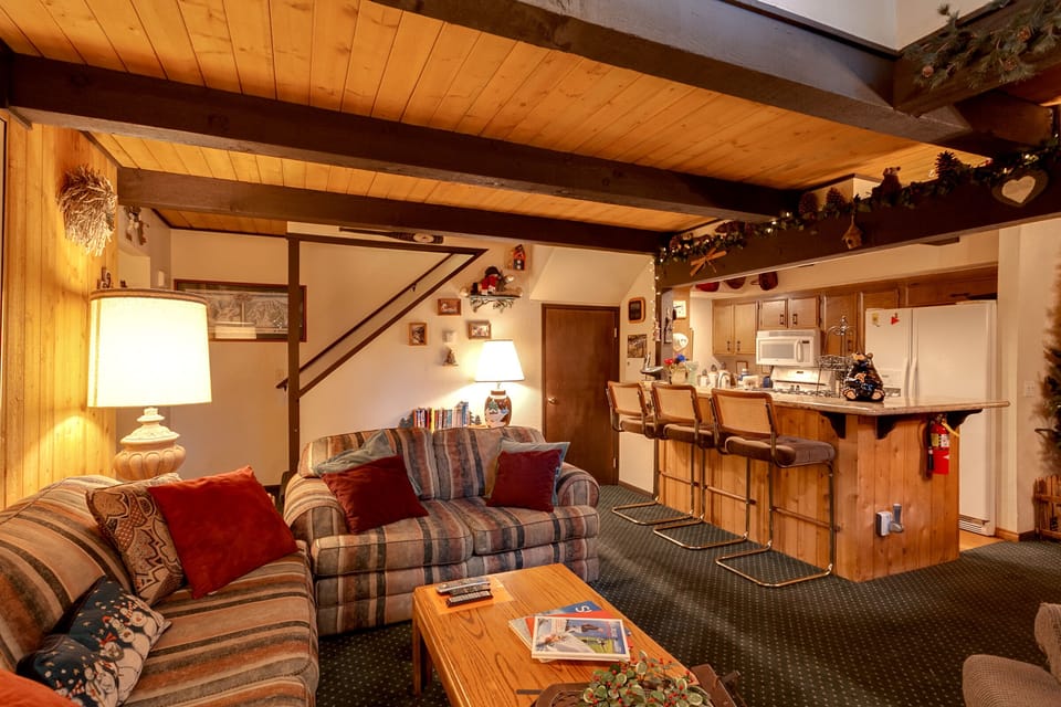 Living Room towards Breakfast Bar / Kitchen & Stairs