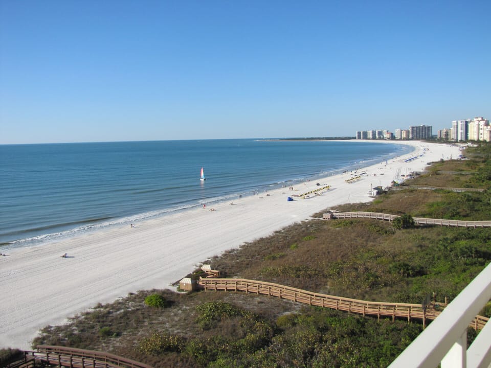 Explore the 3 mile white sand beach known for outstanding shelling