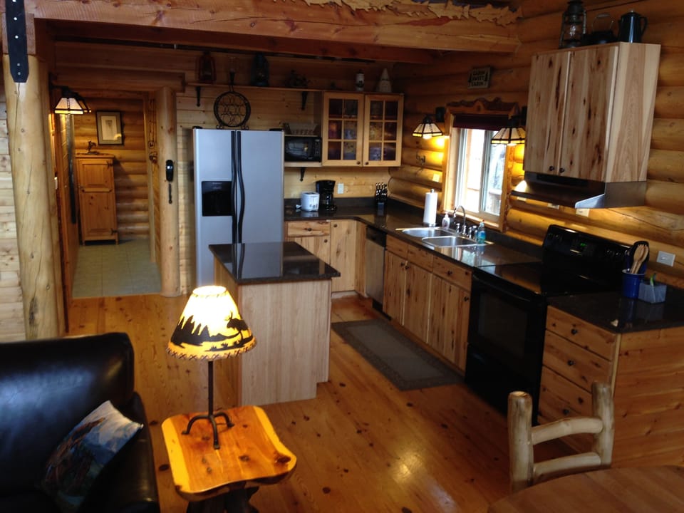 Modern kitchen has everything you need for eating in. 