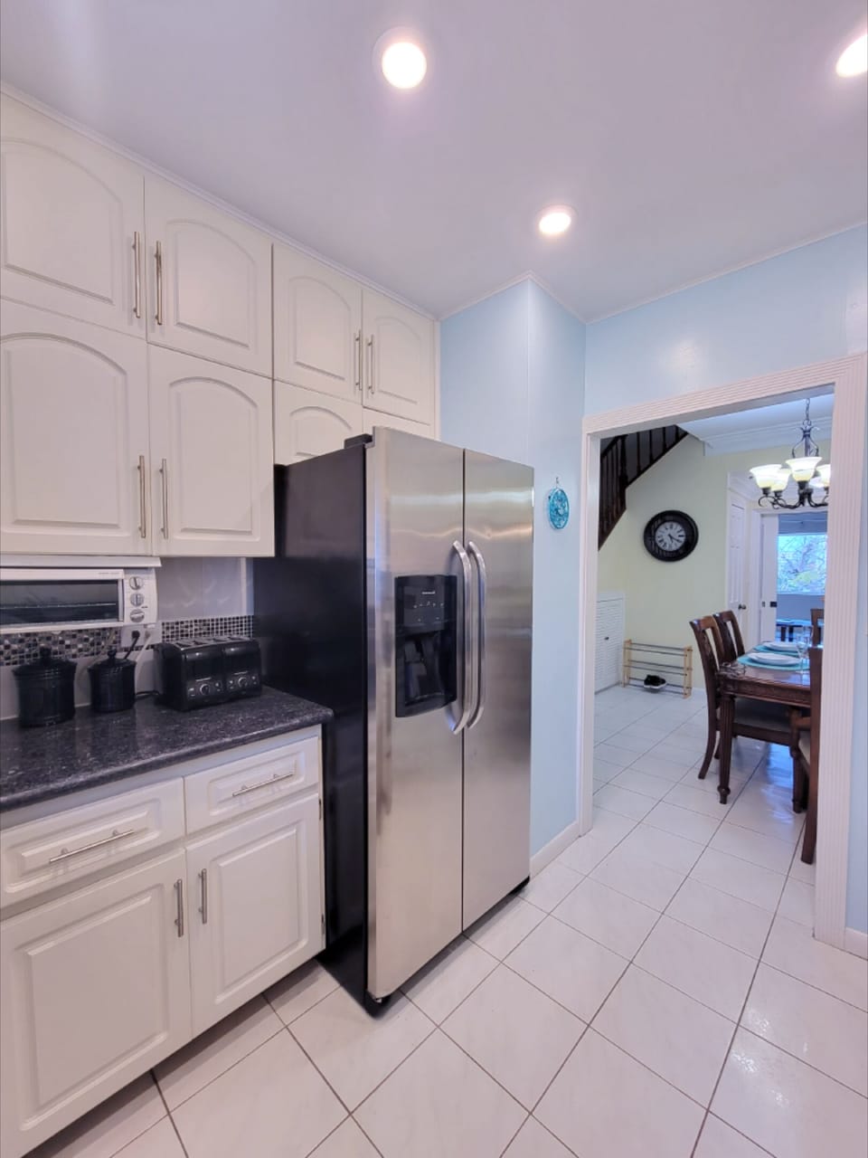 View from the kitchen into the dining area.