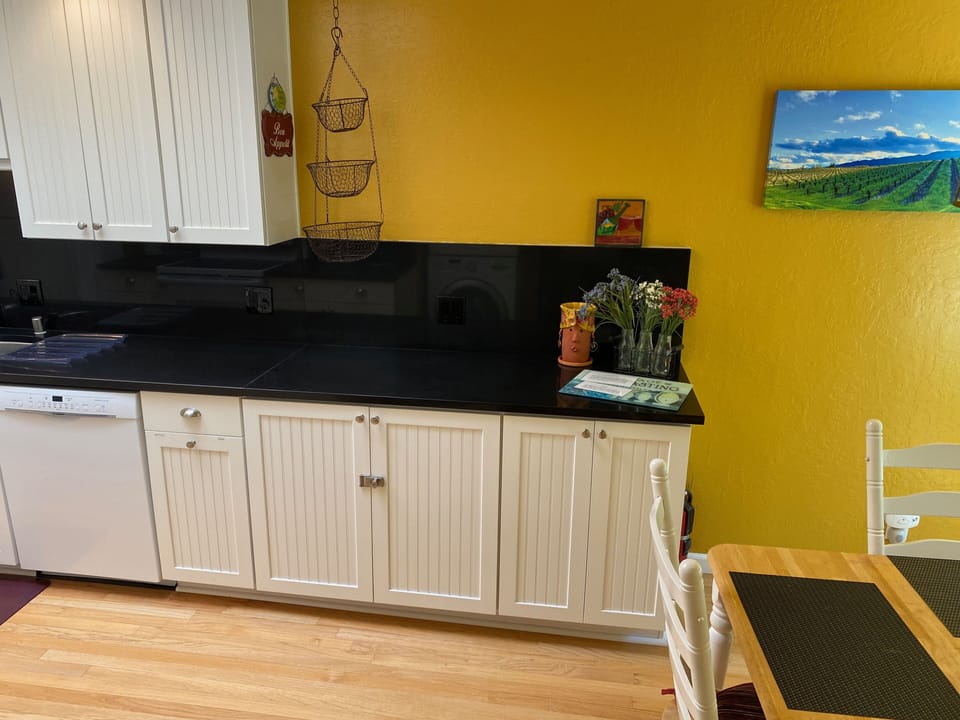 Buffet area great for entertaining / cooking. Spices, foils, oils, everything!