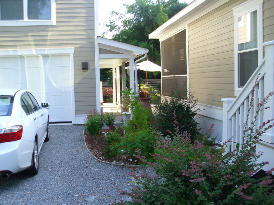 Entrance to the unit on side of the garage.