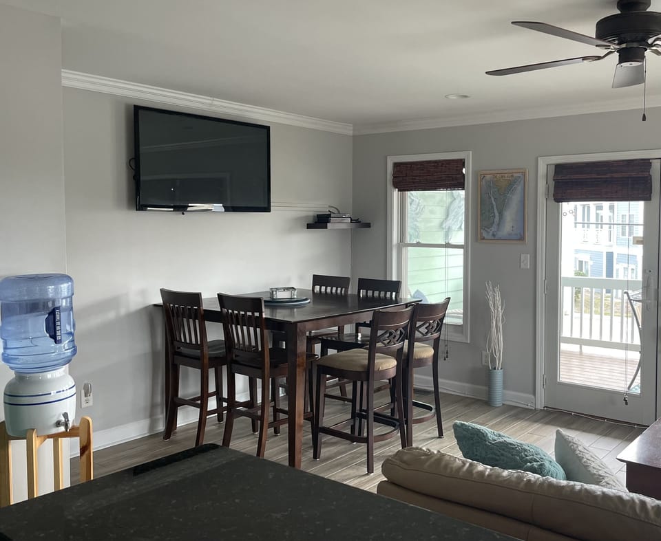 55’ flat screen seen from all of living area