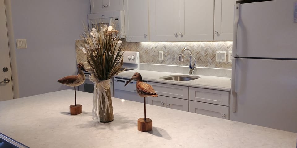 Eat-In Kitchen & Back Door-Entrance closest to the beach & our 2 parking spaces 