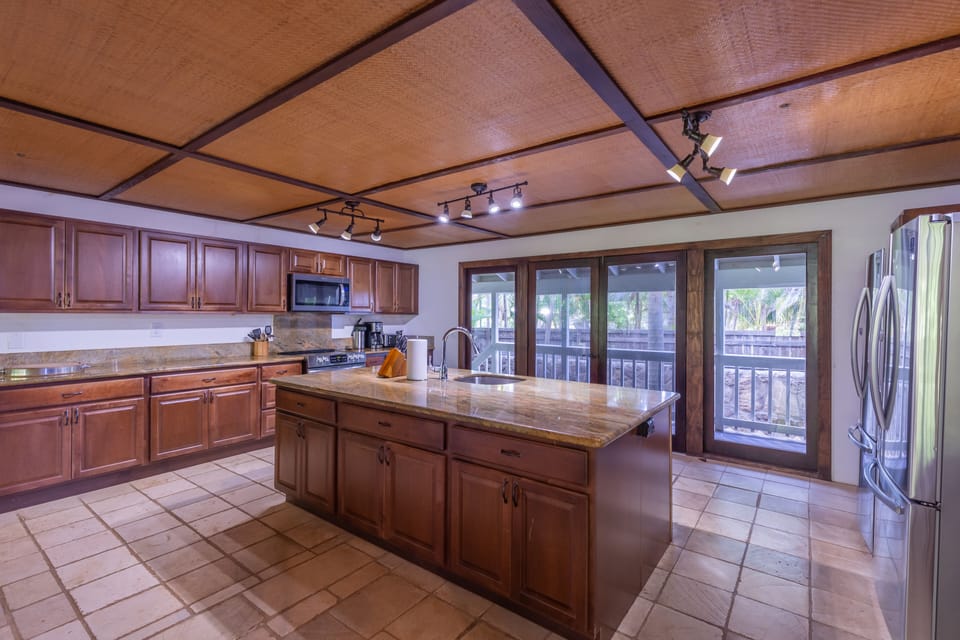 Large kitchen with all new appliances and two refrigerators