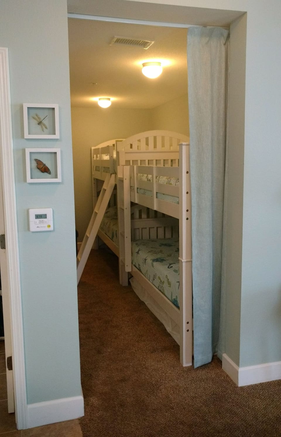 Bunk room with two doubles and an additional twin mattress underneath