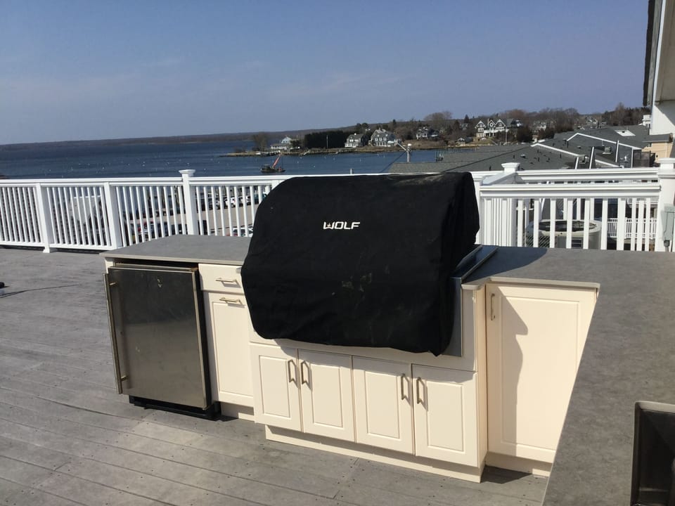 Wolf  Grill and Beverage Refrigerator Located On Large Roof Top Deck, great view