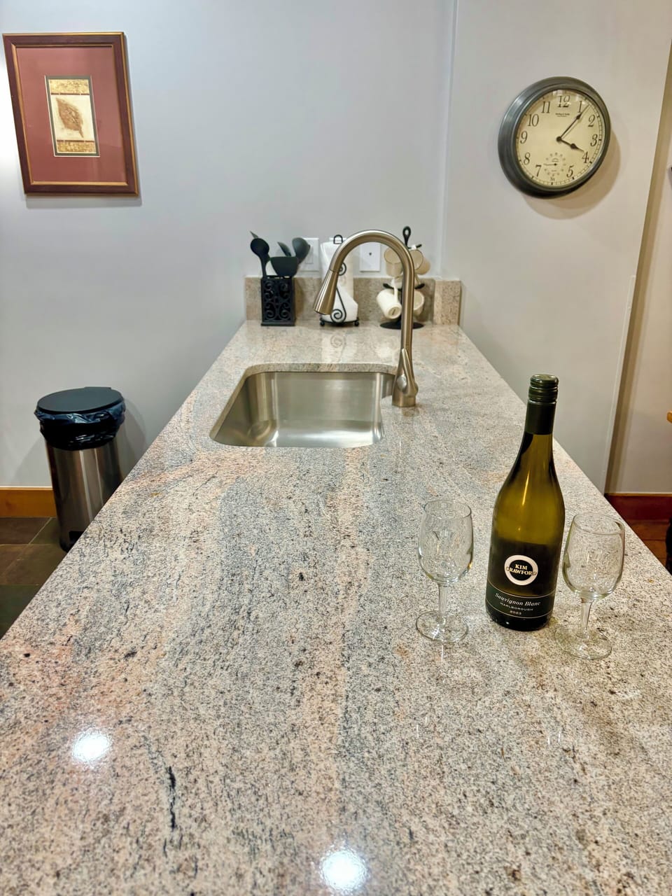 Large granite work surface for meal prep with beautiful movement!