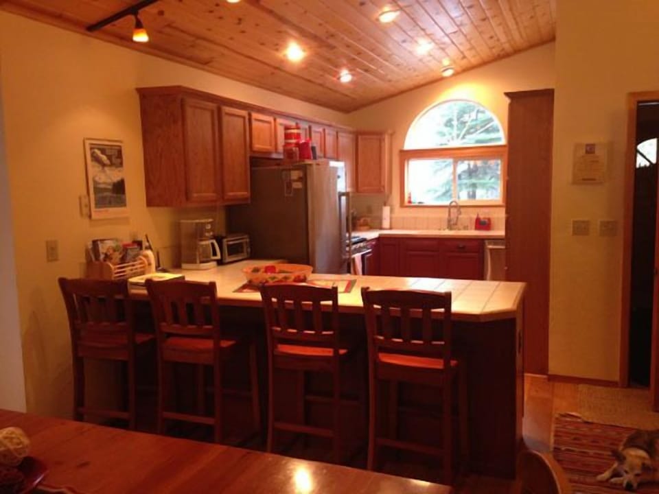 Newly remodeled kitchen with all new appliances and wide-plank wood floors