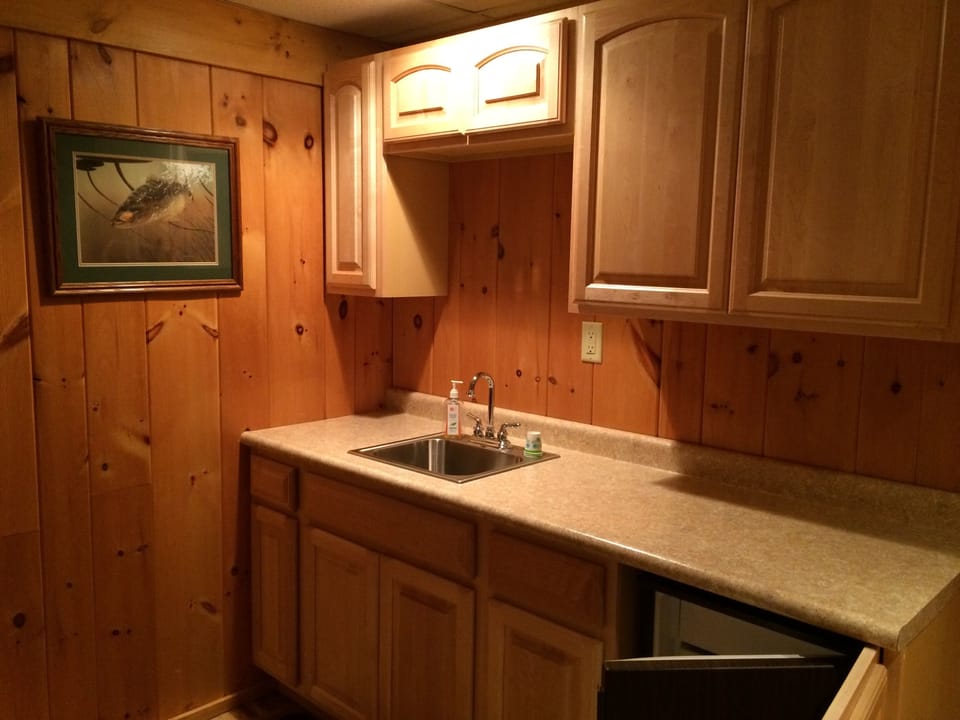 Wet bar w/ built in fridge in rec-room is ideal for entertaining...