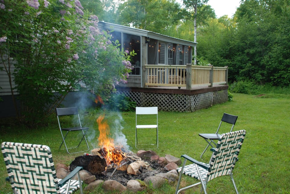 Enjoy evenings with the fire-pit or in the screened in porch