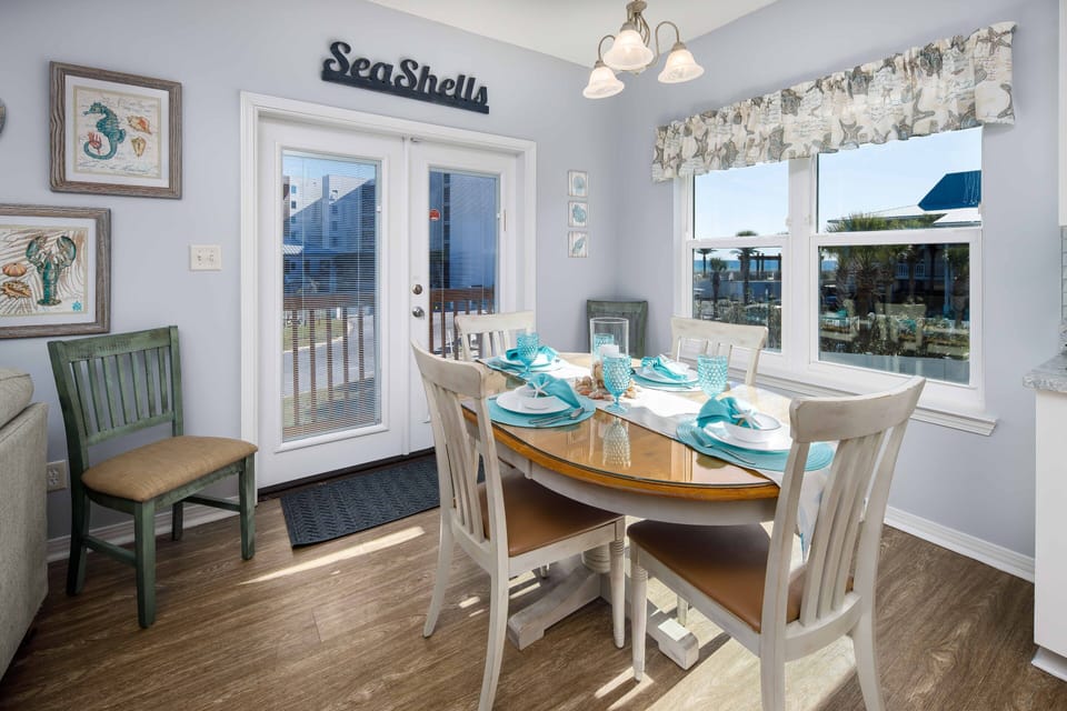 Dine, with seating for up to six people, while enjoying partial gulf views 