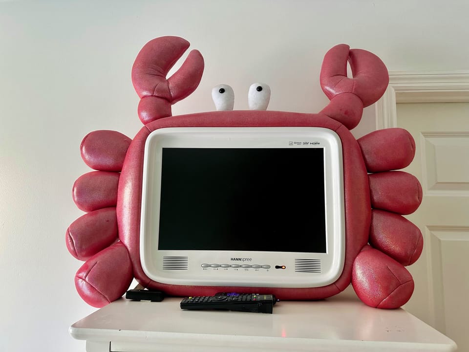 Bedroom with a Queen, twin bunkbeds, and a crab TV!