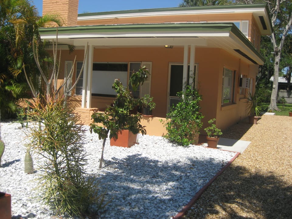 Front entrance with cactus yard and driveway
