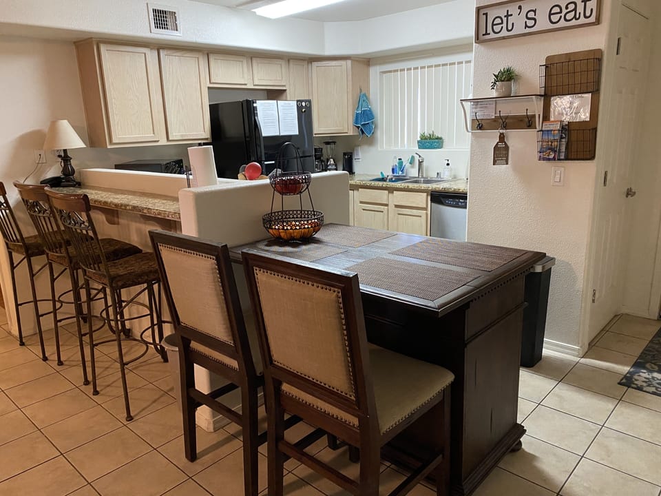 NEW island with extra storage, seating and counter space.