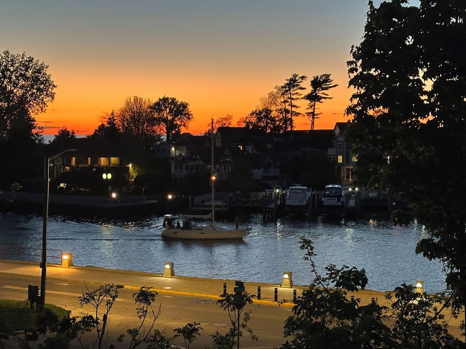 Take a walk down the street to catch a beautiful sunset over Black River!