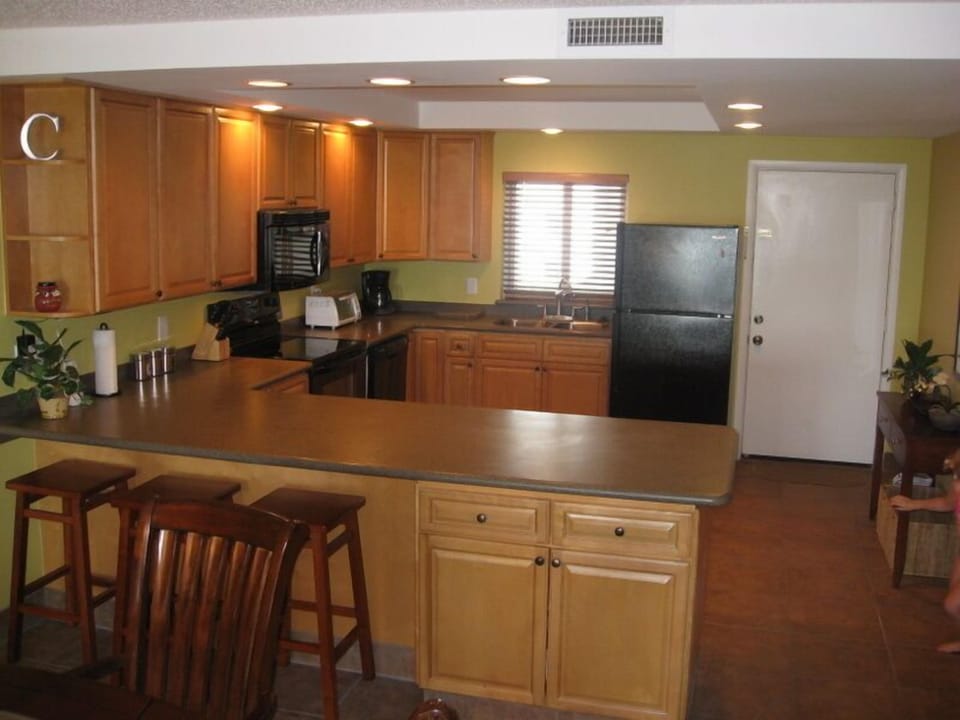 Kitchen looking toward front of the building (away from beach)