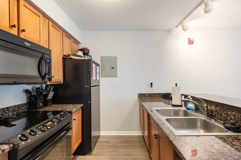 Kitchen with Refrigerator, Microwave, Oven, & Dishwasher