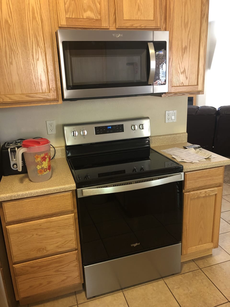 Electric range and oven, with a microwave oven above