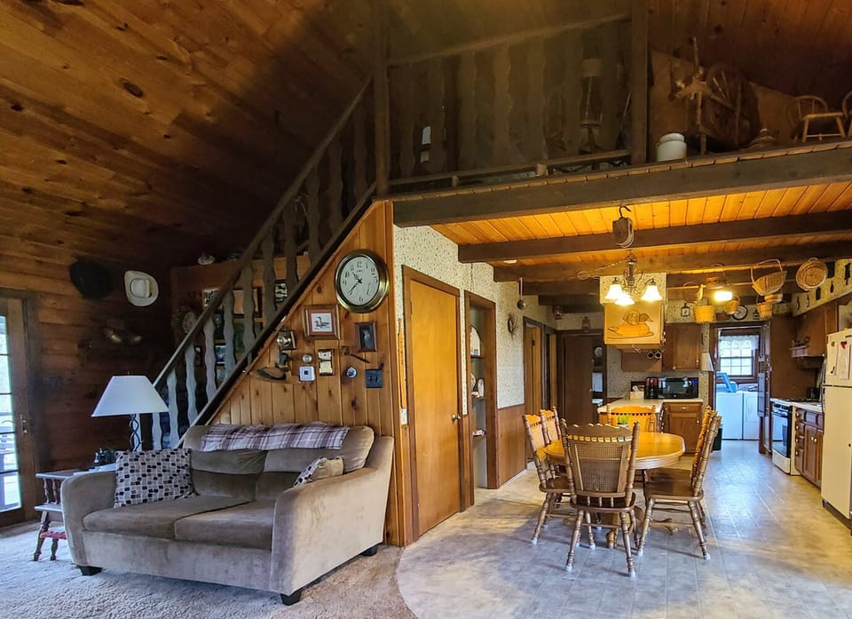 View of loft, dining and kitchen areas