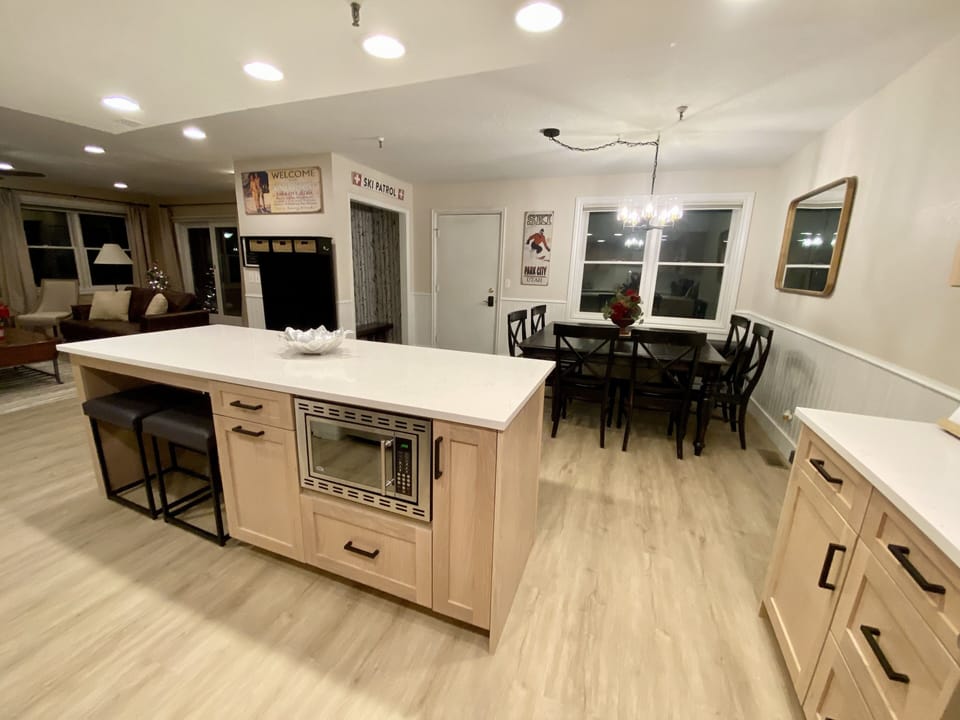 Large 8 foot island w/microwave, trash/recycling drawer & fully stocked kitchen