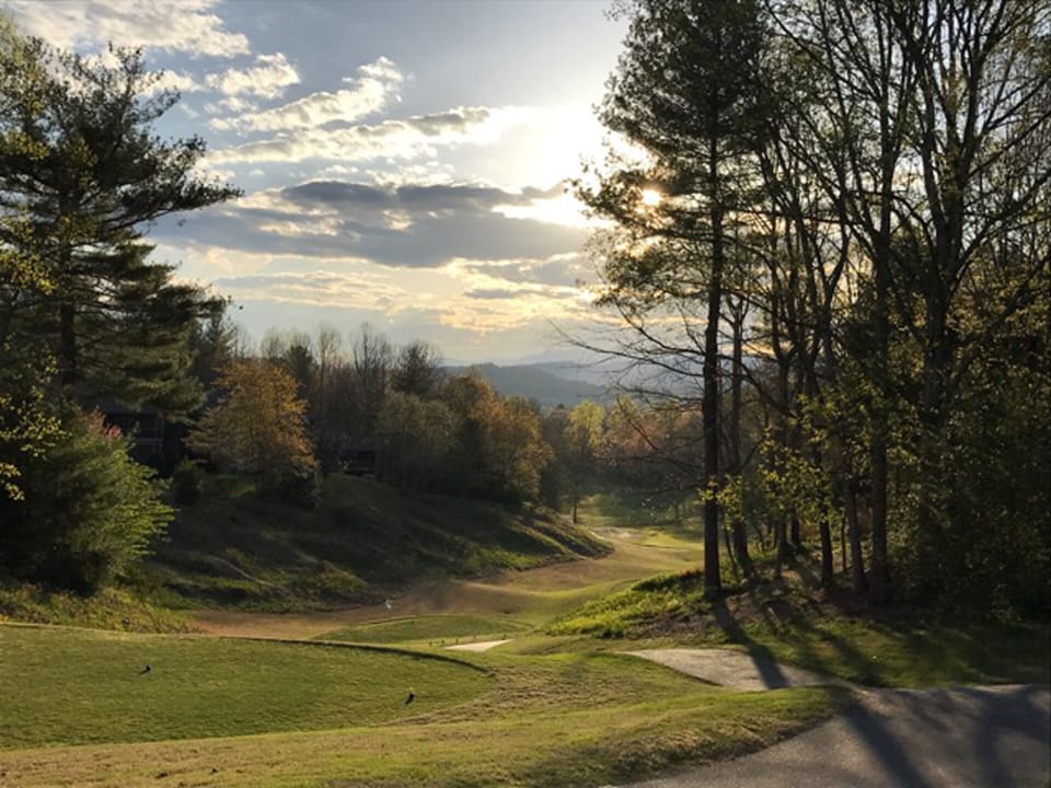 18th fairway with our condo tucked behind the trees on the left