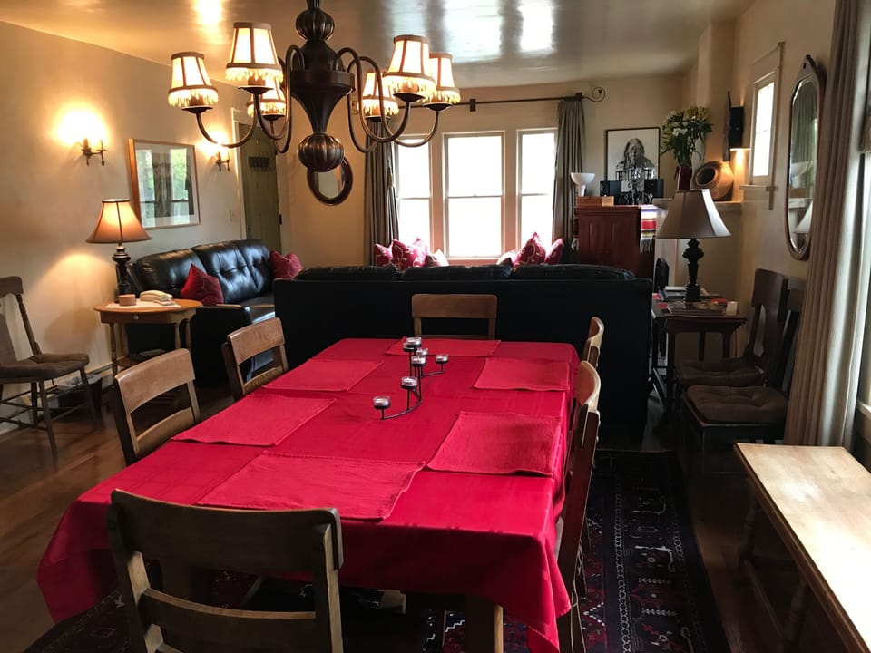 Dining table expands to seat 14 people; drop leaf table adds seating or buffet.