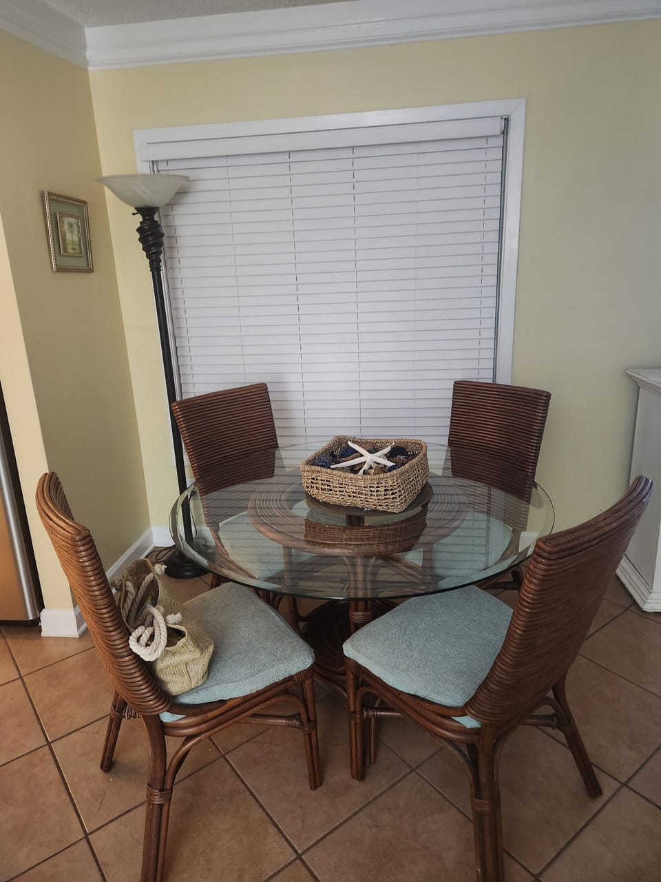 Dining area with large window overlooking golf course