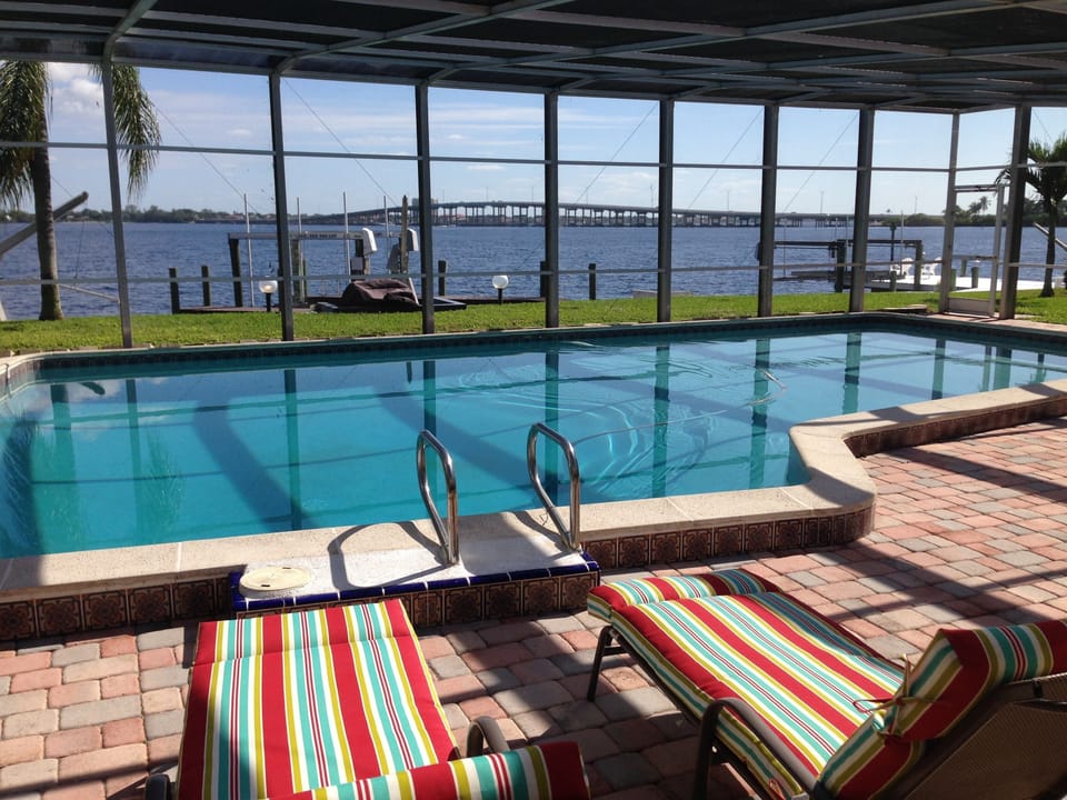 Enjoy Lounging around the heated pool