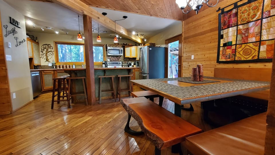 Dining table with adjacent island seating