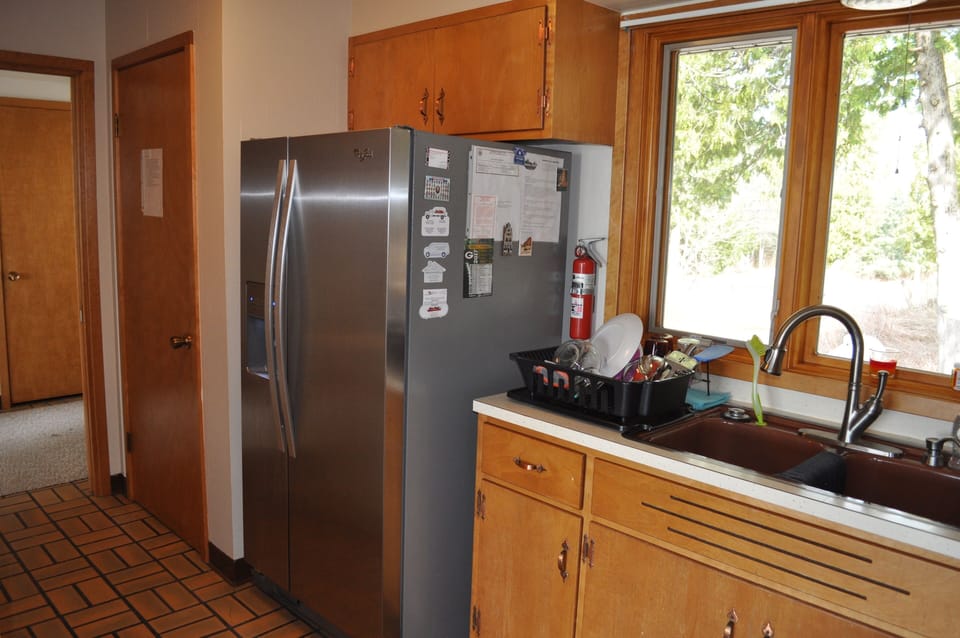 Refrigerator has filtered water in the door.
