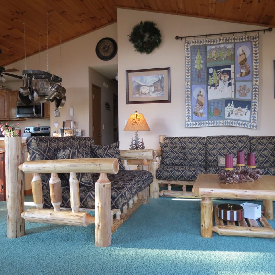Open concept, from living room to kitchen and hallway leading to guest bedrooms