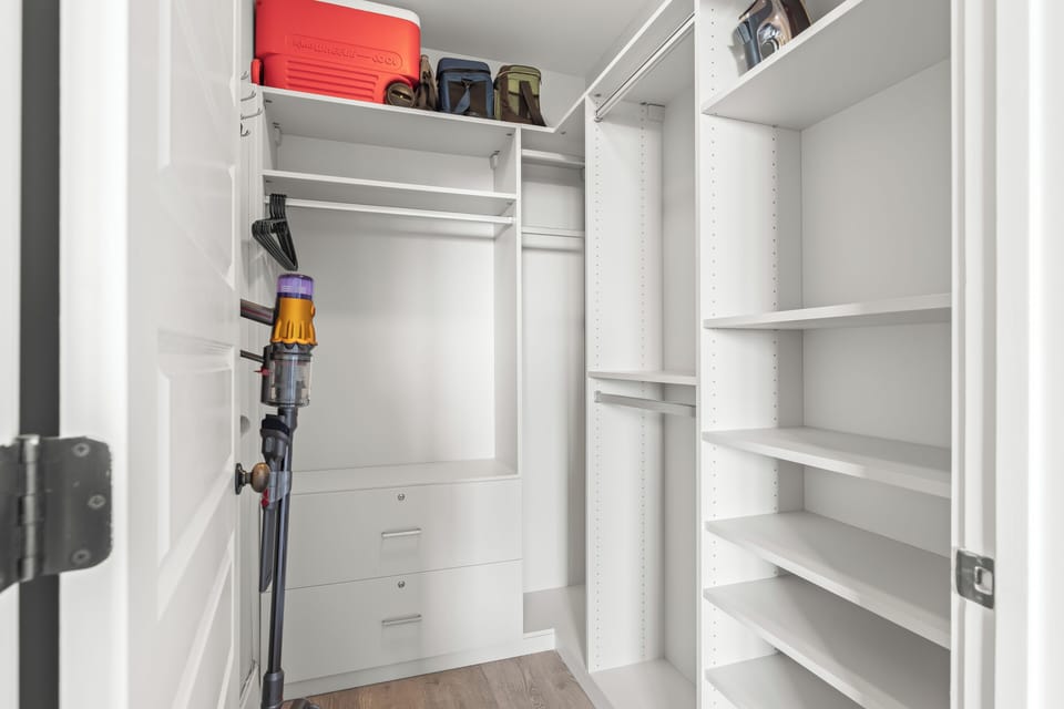 Large walk in California Closet in primary bedroom.